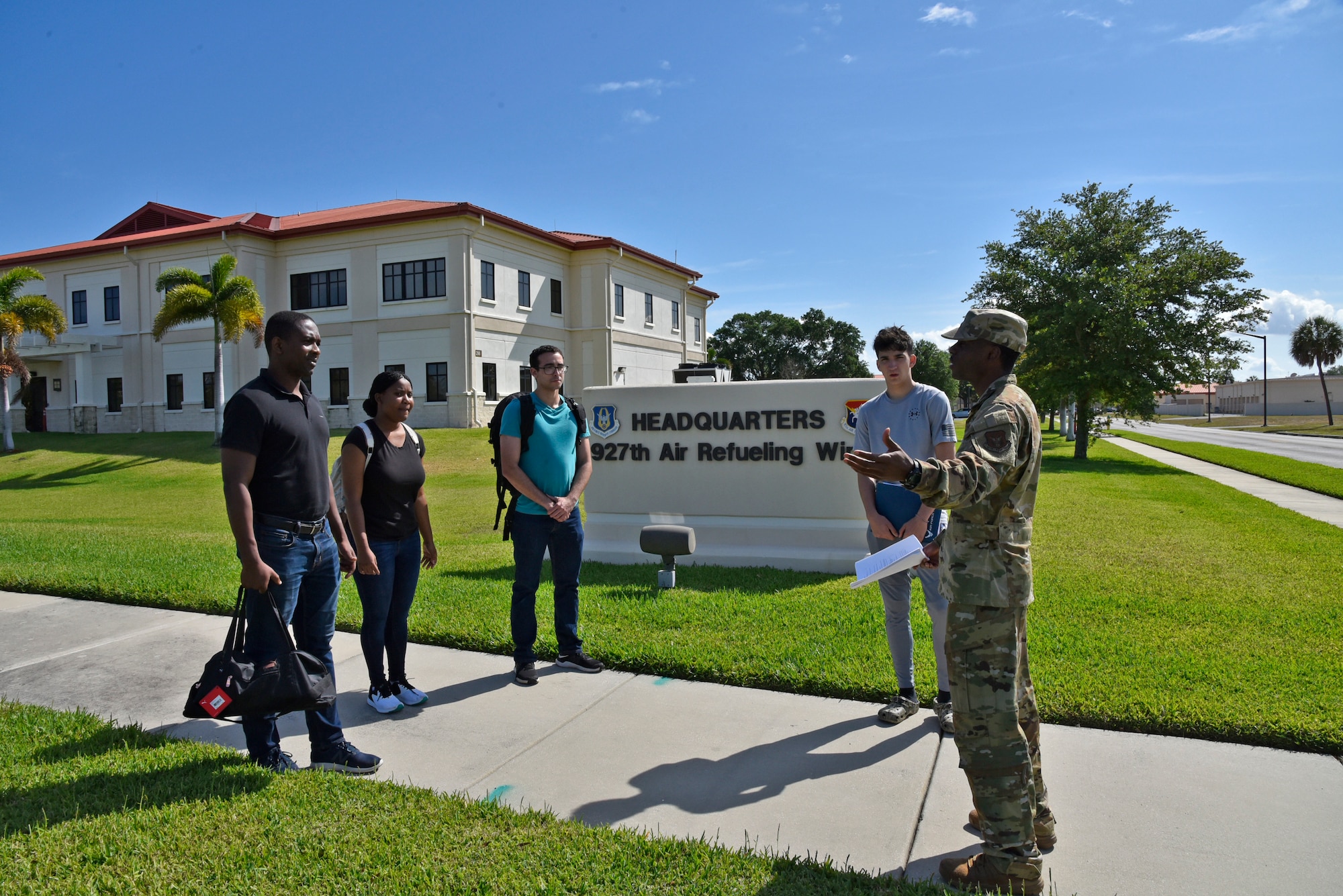 On 24 March, 2020 Staff Sgt. Dejaniee Hutchinson, 927th Developmental Training Fight facilitator, MacDill AFB, Fl., delivered final travel and Basic Military Training reporting instructions to four future 927th Air Refueling Wing Airmen. (U.S. Air Force photo by Tech. Sgt. Peter Dean)