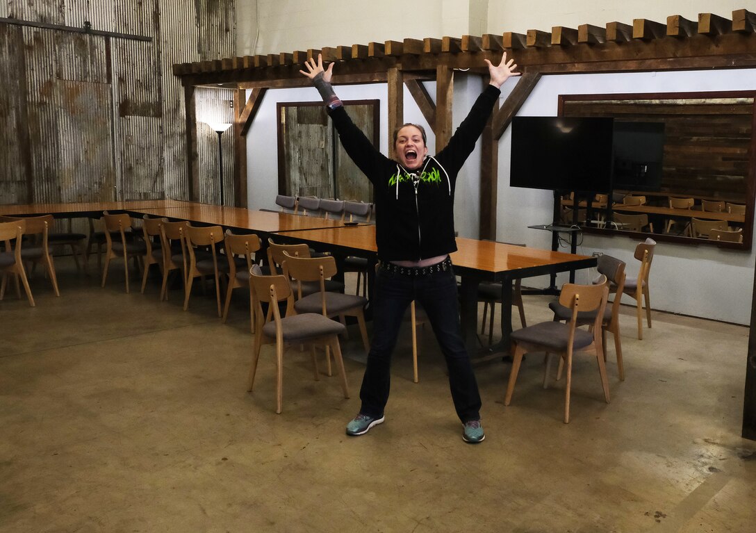 Lauren Hanyok shows off the meeting spaces at The Garden.
