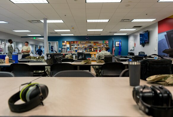 Maintainers take a work break March 23, 2020 while efforts to curtail the coronavirus have reduced manning levels at Luke Air Force Base, Ariz.
