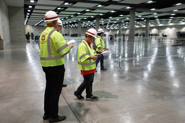 As part of a local U.S. Army Corps of Engineers (USACE) response to the spread of coronavirus in Honolulu, a five-man USACE technical survey team conducted a site assessment of the 204,000 square foot exhibition hall at the Honolulu Convention Center on March 23, 2020.