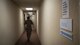 Tech. Sgt. Jessica Oliver, 2nd Communications Squadron base equipment control office NCO-in-charge, walks through the down a hallway at the 2nd CS on Barksdale Air Force Base, La., March 20, 2020. Oliver manages all IT hardware and software across the base. (U.S. Air Force photo by Tech. Sgt. Daniel Martinez)