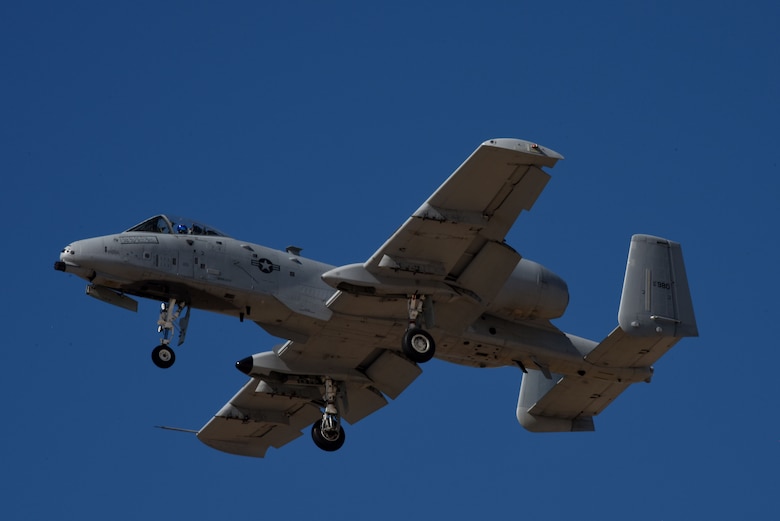 A photo of a plane flying over DM