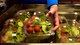 A 354th Fighter Wing Airman grabs a to-go salad from the Two Seasons Dining Facility on Eielson Air Force Base, Alaska, March 21, 2020. The installation has banned all dining in at food establishments on base in an effort to enforce social distancing and mitigate the spread of the novel coronavirus. Patrons are still able to order food to carry out. (U.S. Air Force photo by Senior Airman Beaux Hebert)