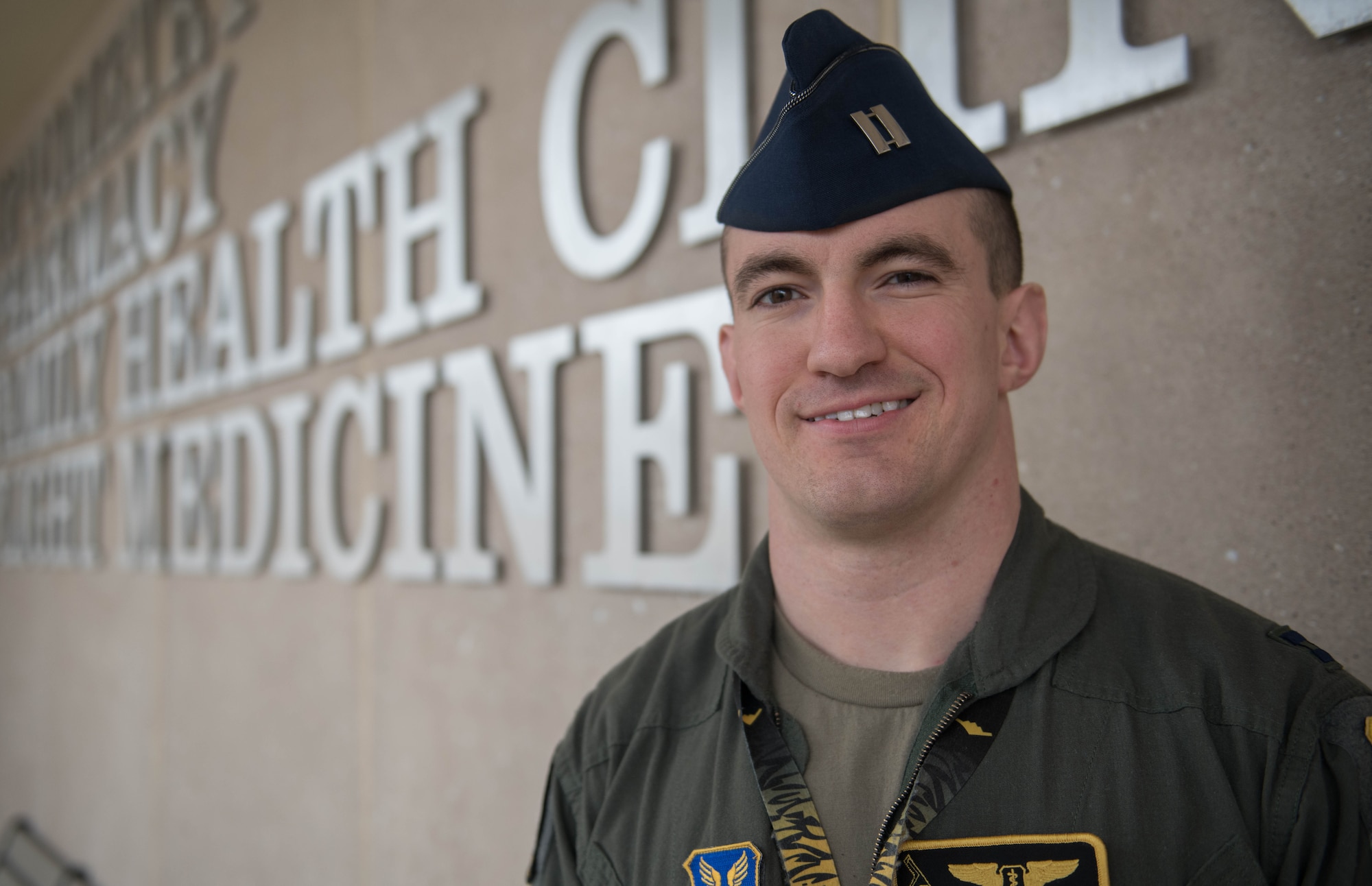 Air Force Capt. (Dr.) Joseph Sharp, a 509th Medical Group flight surgeon, stands in front of the clinic at Whiteman Air Force Base, Missouri, March 1, 2020. Sharp earned the Air Force Global Strike Command “Flight Surgeon of the Year Award” for his innovative practices and dedication to his patients. (U.S. Air Force Photo by Airman 1st Class Thomas Johns)