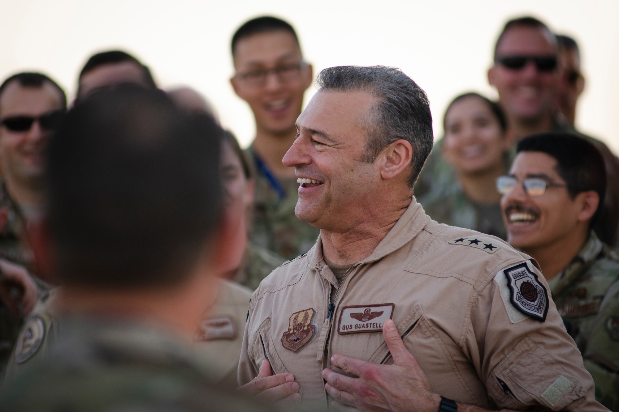 U.S. Air Force Lt. Gen. Joseph Guastella, U.S. Air Forces Central Command Commander, speaks with AFCENT Airmen outside of the combined air operations center at Al Udeid Air Base, Qatar, March 6, 2020.