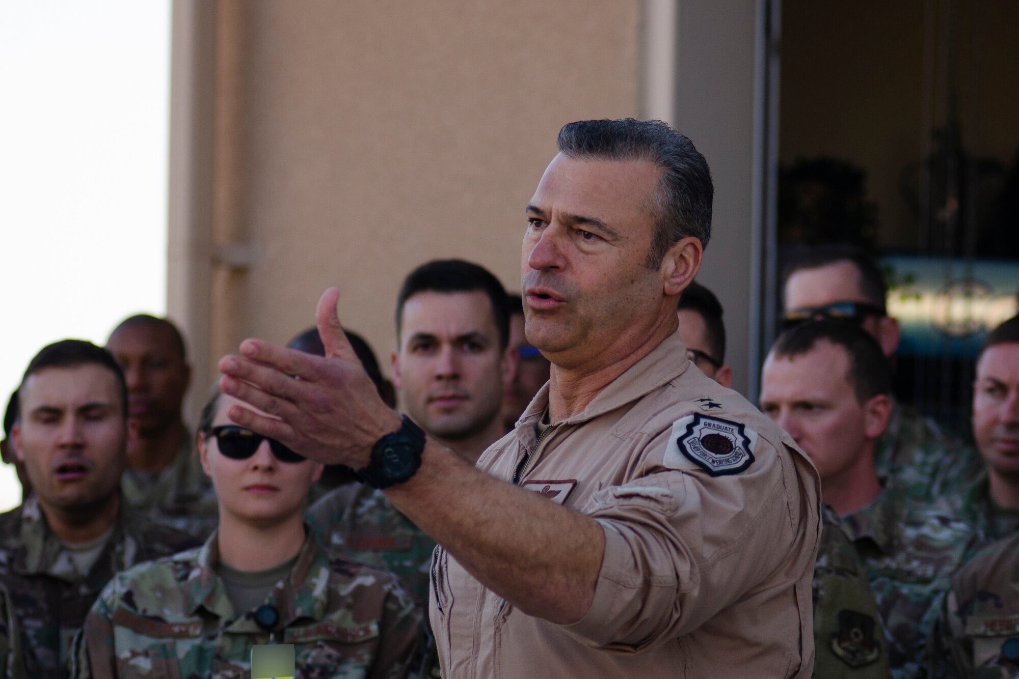 U.S. Air Force Lt. Gen. Joseph Guastella, U.S. Air Forces Central Command Commander, speaks with AFCENT Airmen outside of the combined air operations center at Al Udeid Air Base, Qatar, March 6, 2020.