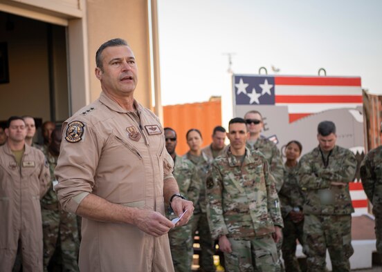 U.S. Air Force Chief Master Sgt. Shawn Drinkard, U.S. Air Forces Central Command command chief, speaks with AFCENT Airmen outside of the combined air operations center at Al Udeid Air Base, Qatar, March 6, 2020.