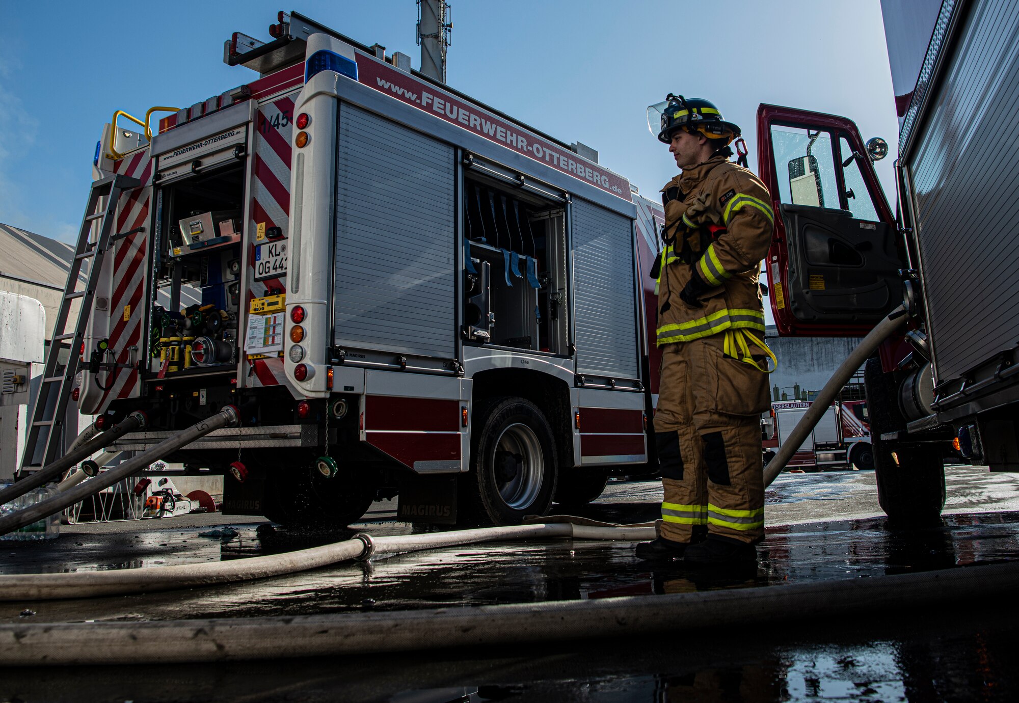 U.S. Air Force Airman 1st Class Jackson Bird, 86th Civil Engineer Squadron Fire and Emergencies firefighter, supervises the transfer of water from Ramstein Air Base’s fire truck to the German fire truck in Otterberg, Germany, March 23, 2020.