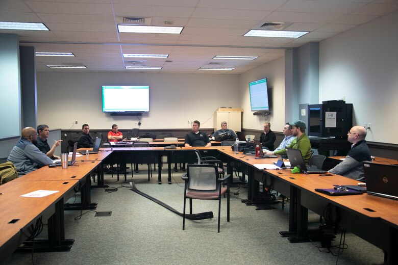 Members of the Norfolk District Alternate-Care-Site planning and assessment team receive there initial guidance while using proper social distancing and disbursing throughout one of the District's training rooms. The team is responsible for evaluating existing building to see if the can be converted to Alternate-Care-Sites, should the need arise from the potential influx of COVID-19 patients.