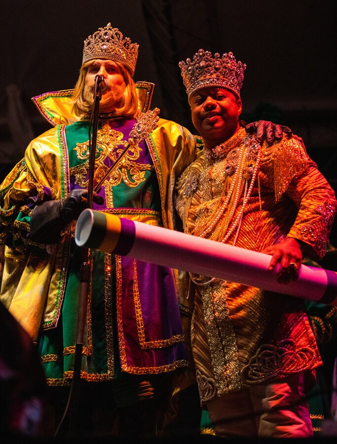 Joseph Storey Charbonnet, King of Rex, left, addresses a crowd with Brian M. Sims, King of Zulu  during Lundi Gras at the Riverfront Park, New Orleans, February 24, 2020. The Zulu organization hosts the Zulu parade each year on Mardi Gras Day and is New Orleans' largest predominantly African-American carnival organization. (U.S. Marine corps photo by Lance Cpl. Samwel Tabancay)