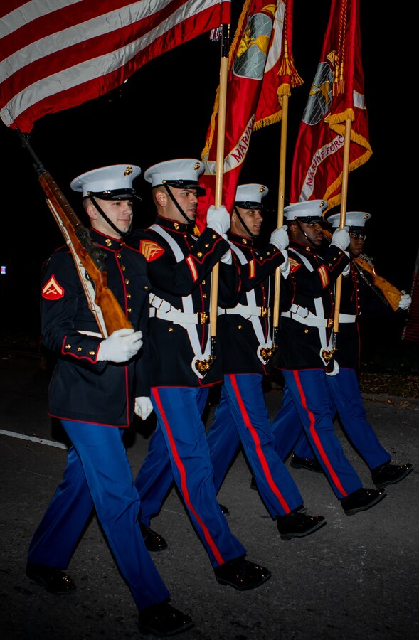 Marines with the Marine Forces Reserve Color Guard participate in the Krewe of Alla Mardi Gras Parade in New Orleans, Feb. 14, 2020. MARFORRES participation in parades give Marines the opportunity to enjoy the festivities while showcasing military support in the community during Mardi Gras Season. (U.S. Marine Corps photo by Lance Cpl. Ashley I. Barreno)