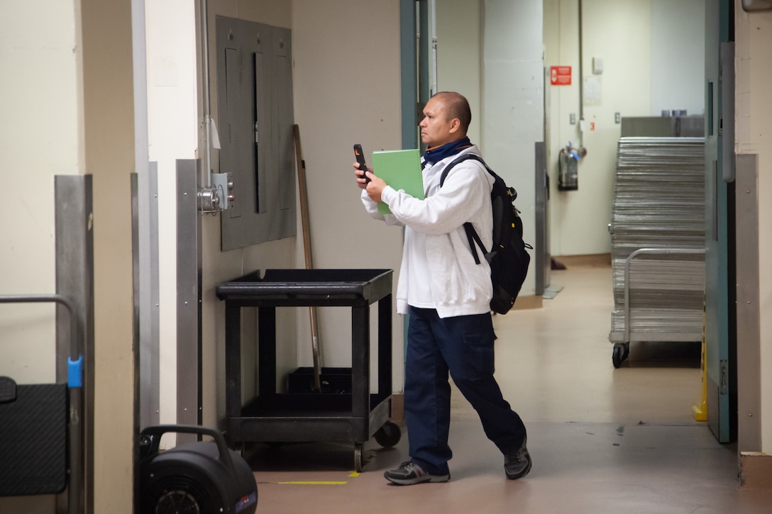 Yat Hung Chan, a mechanical engineer with the U.S. Army Corps of Engineers Sacramento District, assesses a facility in Santa Clara, California, to help determine its potential to serve as an alternate care facility.