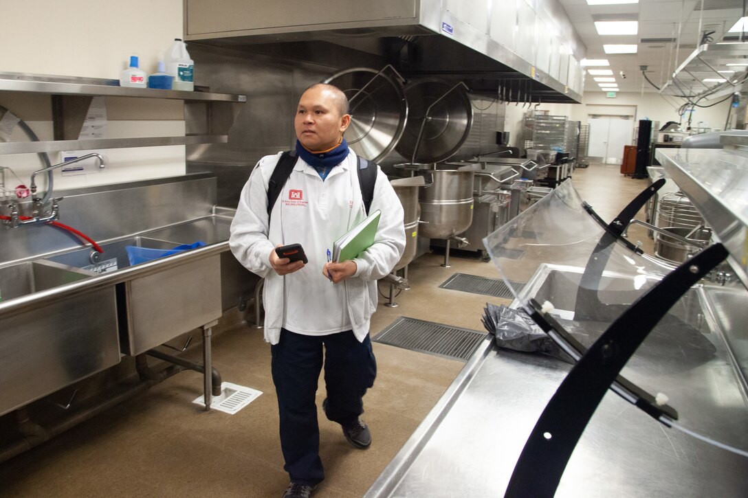 Yat Hung Chan, a mechanical engineer with the U.S. Army Corps of Engineers Sacramento District, assesses a facility in Santa Clara, California, to help determine its potential to serve as an alternate care facility.