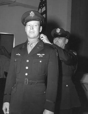U.S. Air Force Lt. Gen. Ira Eaker, Eighth Air Force commander, presents the Medal of Honor to 1st Lt. John C. Morgan Dec. 17, 1943. (Courtesy photo)