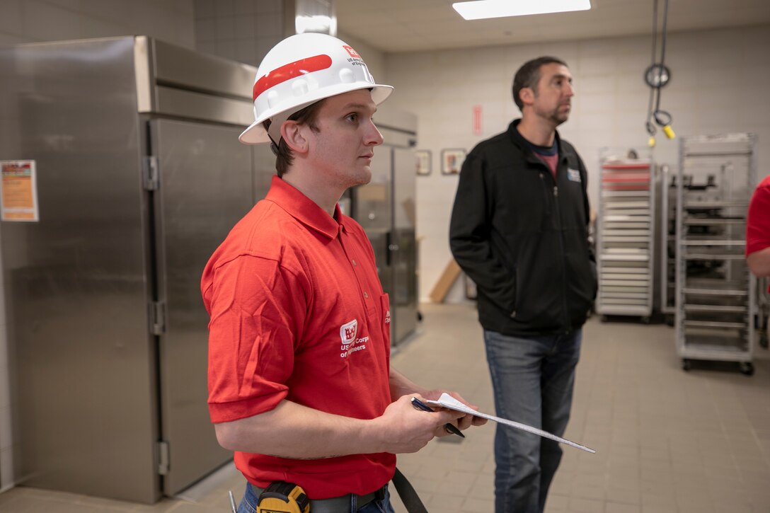 Zachary Ware, a Norfolk District civil engineer, performs a site assessment at a building in Virginia Beach for potential use as an alternate-care-site, should the need arise, for additional medical facilities in the commonwealth of Virginia. (U.S. Army photo by Patrick Bloodgood)