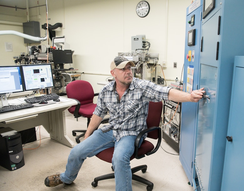 Brian Anderson, an instrumentation specialist, operates the Arc Lamp System in the Aerothermal Calibration Laboratory Jan. 15, 2020, while demonstrating the use of the machine to provide heat to a test cone for use at Arnold Air Force Base, Tenn. (U.S. Air Force photo by Jill Pickett)