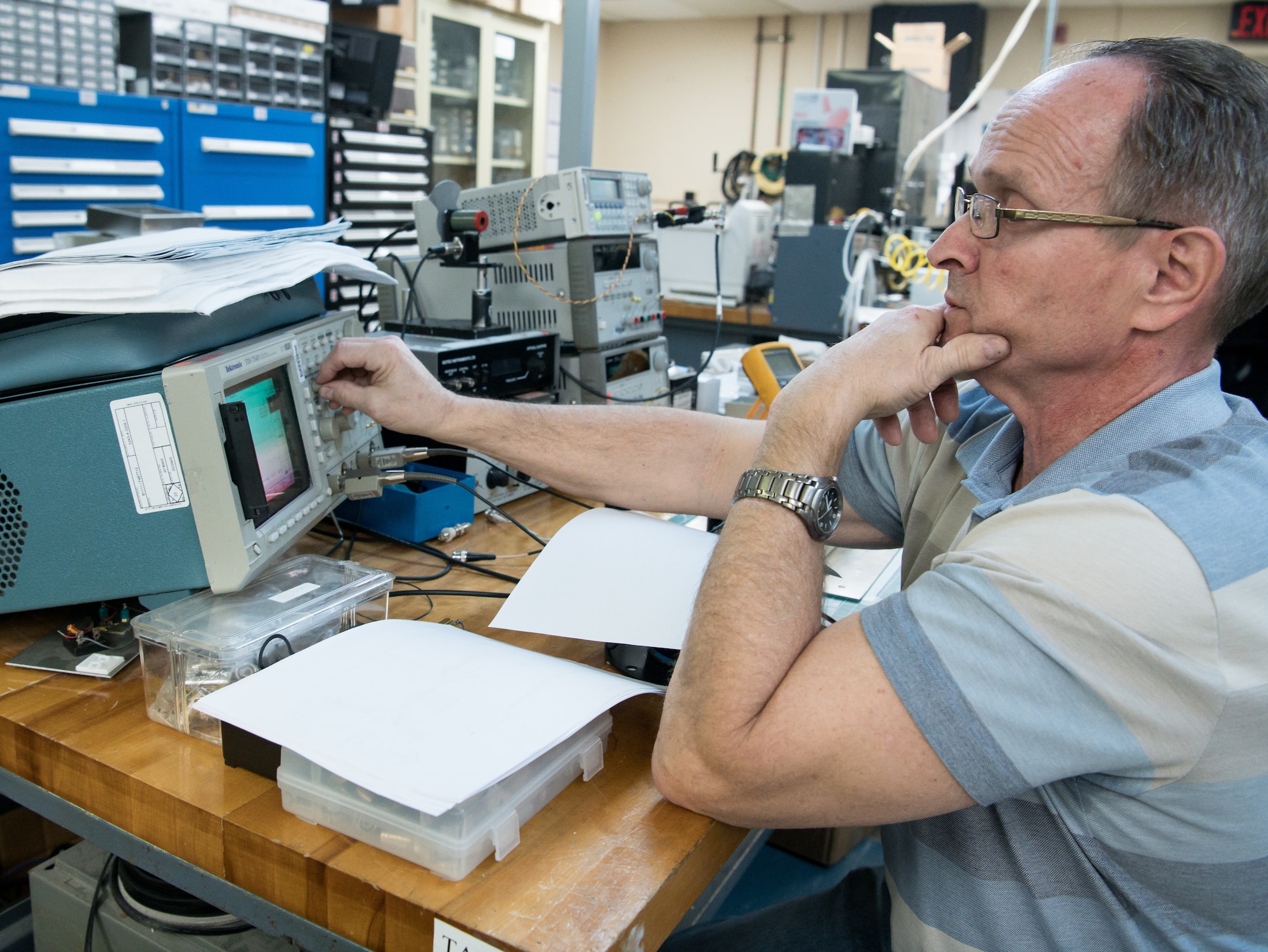 Ron Wood, an instrument technician, uses an oscilloscope Jan. 13, 2020, in the Arnold Engineering Development Complex Test Technology, Analysis and Evaluation Branch Electronics Laboratory at Arnold Air Force Base, Tenn. The oscilloscope measures the changing voltage of an electrical signal. (U.S. Air Force photo by Jill Pickett)