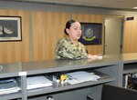 Aviation Boatswain's Mate Handling 1st Class Robin Lewis practices preventative actions by cleaning a counter space in the Administrative area at Naval Support Activity (NSA) Hampton Roads, during the coronavirus outbreak. NSA Hampton Roads personnel cleaned their work areas to continue to help stop the spread of germs and illnesses like the flu and the coronavirus. (U.S. Navy photo by Katisha Draughn-Fraguada/Released)