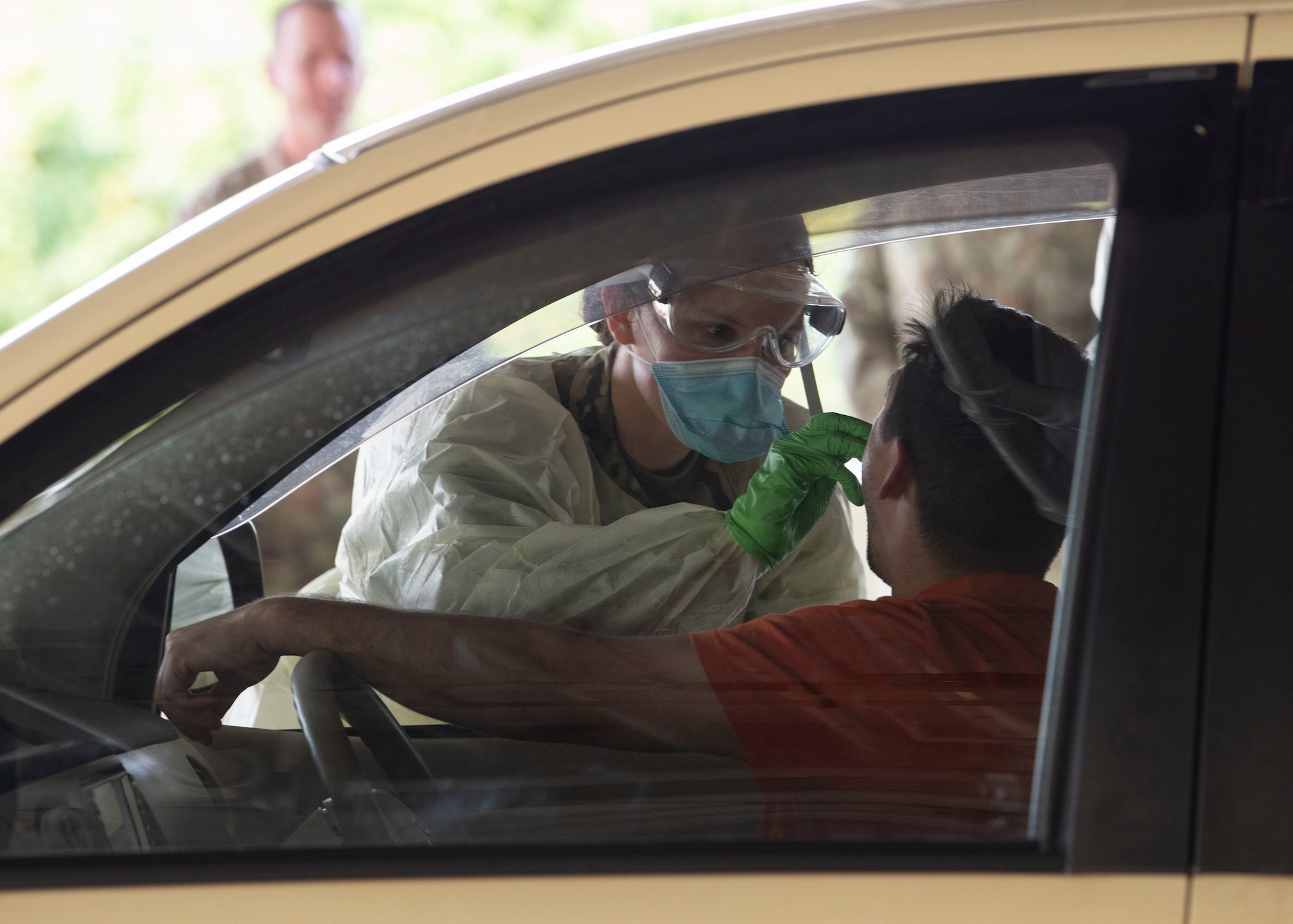 Airmen from the 18th Medical Group conduct COVID-19 testing at Kadena Air Base, Japan, March 20. Under the most current guidance from the Centers for Disease Control, the 18 MDG has increased its testing for the disease.