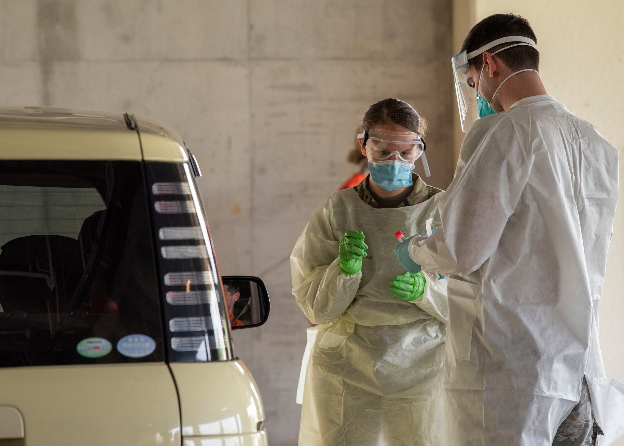 Airmen from the 18th Medical Group conduct COVID-19 testing at Kadena Air Base, Japan, March 20. Under the most current guidance from the Centers for Disease Control, the 18 MDG has increased its testing for the disease.