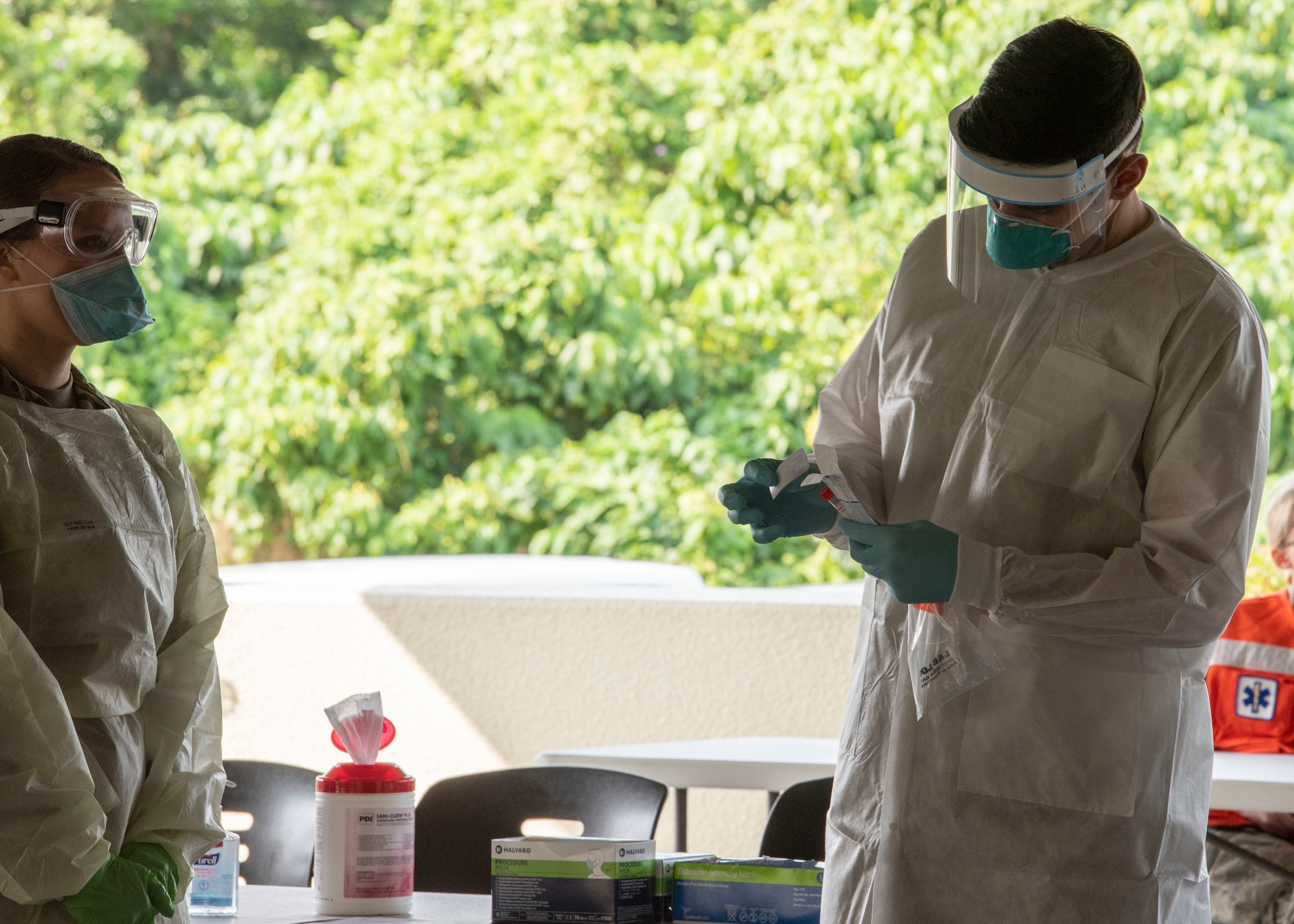 Airmen from the 18th Medical Group conduct COVID-19 testing at Kadena Air Base, Japan, March 20. Under the most current guidance from the Centers for Disease Control, the 18 MDG has increased its testing for the disease.