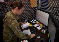 Airman is on a computer