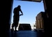 An Airmen prepares to unload boxes.