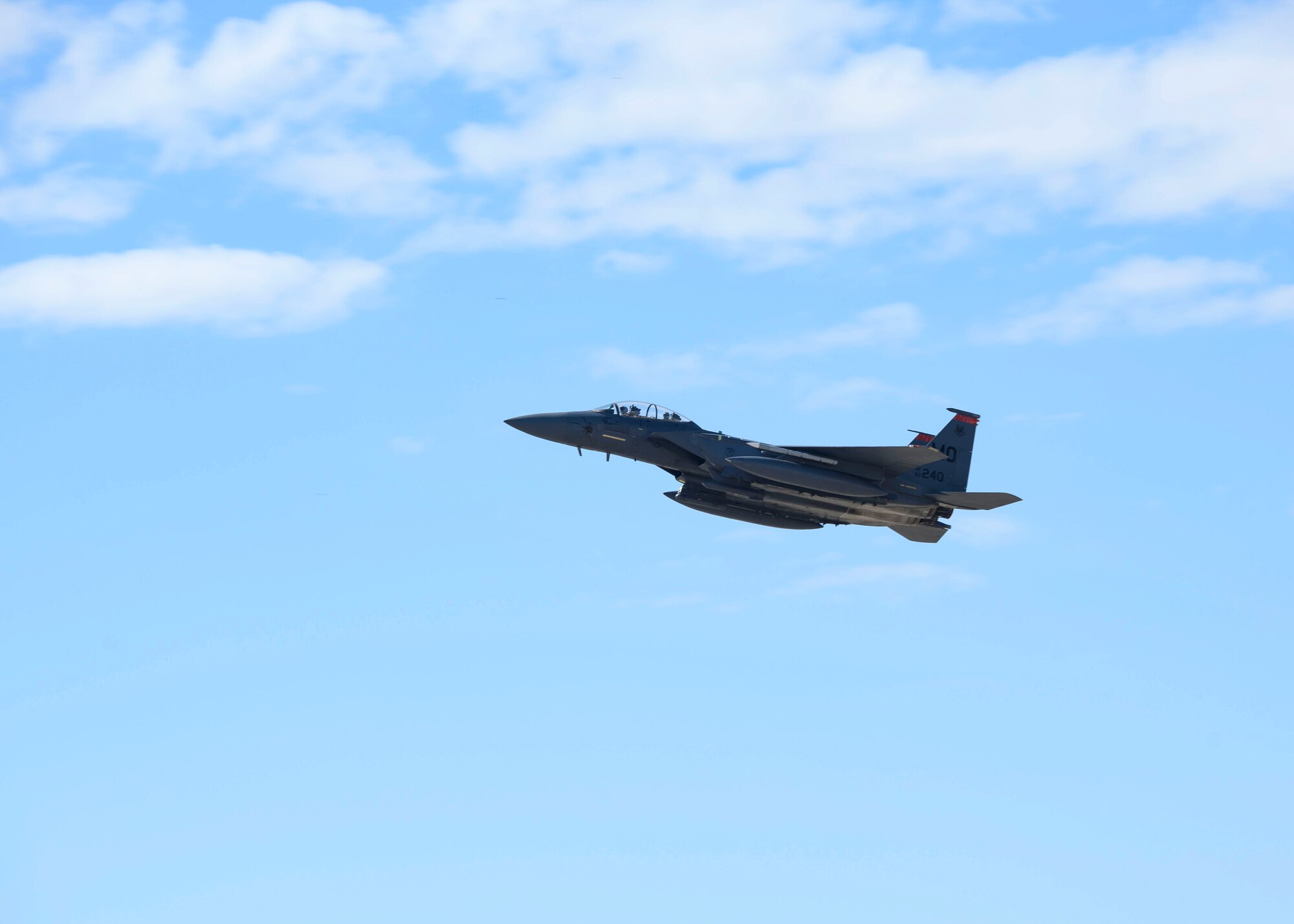 An F-15E Strike Eagle from the 391st Fighter Squadron takes off during a flight exercise, March 16, 2020, at Mountain Home Air Force Base. The Gunfighters are maintaining their total force efforts in the midst of schedule changes due to COVID-19. (U.S. Air Force photo by Senior Airman Tyrell Hall)