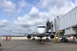 Airplane parked at an airport gate.