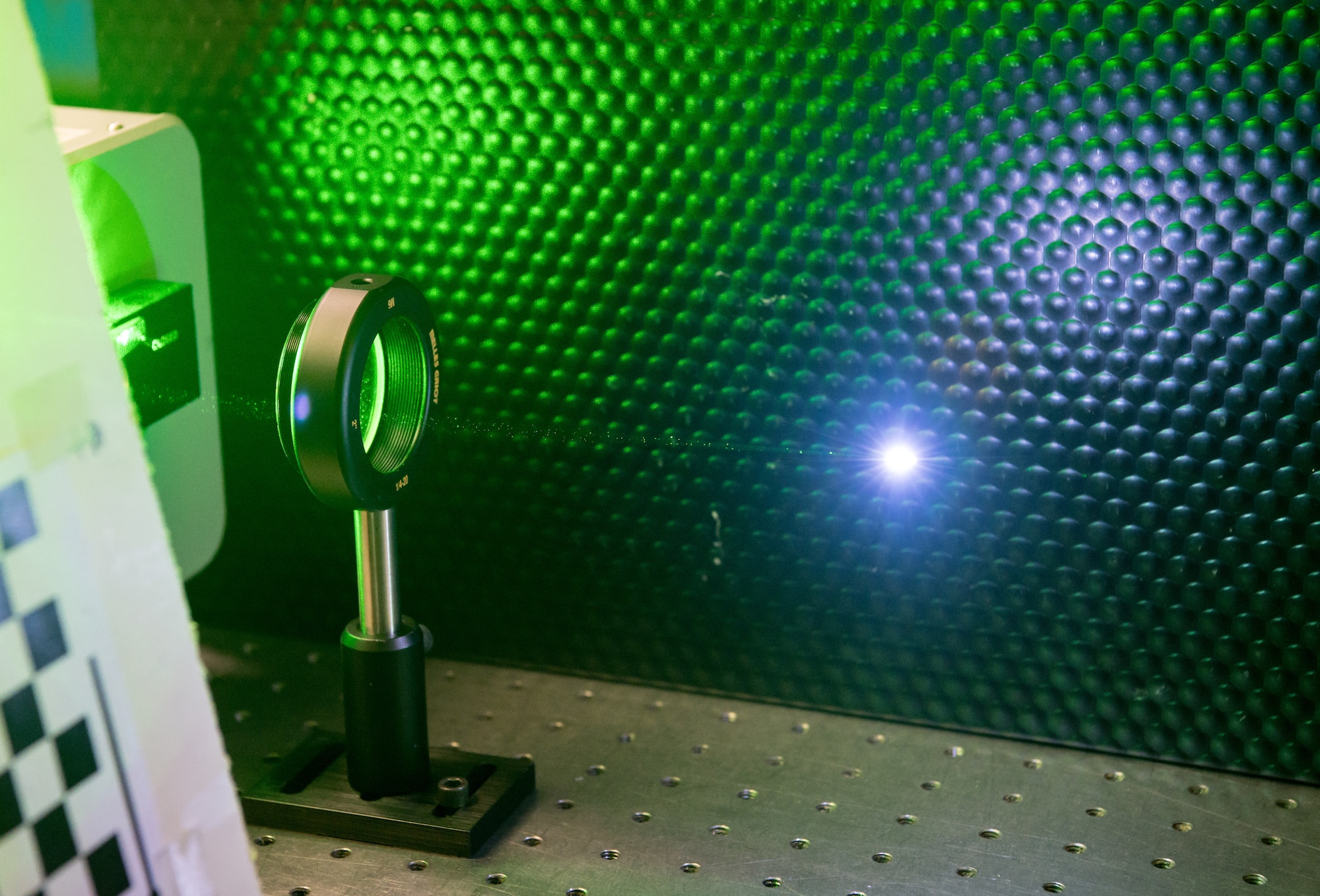 A pulse laser ionizes air Jan. 13, 2020, in the Laser Laboratory at Arnold Air Force Base, Tenn. The Arnold Engineering Development Complex (AEDC) Test Technology, Analysis and Evaluation Branch develops measurement and diagnostic techniques utilizing the lasers in the lab that can then be fielded in AEDC test cells.  (U.S. Air Force photo by Jill Pickett)