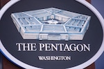 Pentagon sign in the Pentagon Briefing Room.
