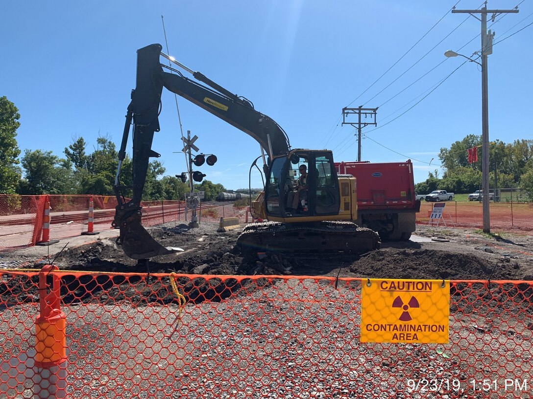 A contractor for the U.S. Army Corps of Engineers St. Louis District’s Formerly Utilized Sites Remedial Action Program (FUSRAP) operates an excavator to conduct remediation on Eva Avenue in Hazelwood, Missouri, during utility support for roadwork in North St. Louis County Monday, Sept. 23, 2019.