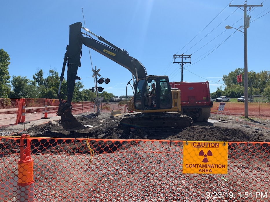 A contractor for the U.S. Army Corps of Engineers St. Louis District’s Formerly Utilized Sites Remedial Action Program (FUSRAP) operates an excavator to conduct remediation on Eva Avenue in Hazelwood, Missouri, during utility support for roadwork in North St. Louis County Monday, Sept. 23, 2019.