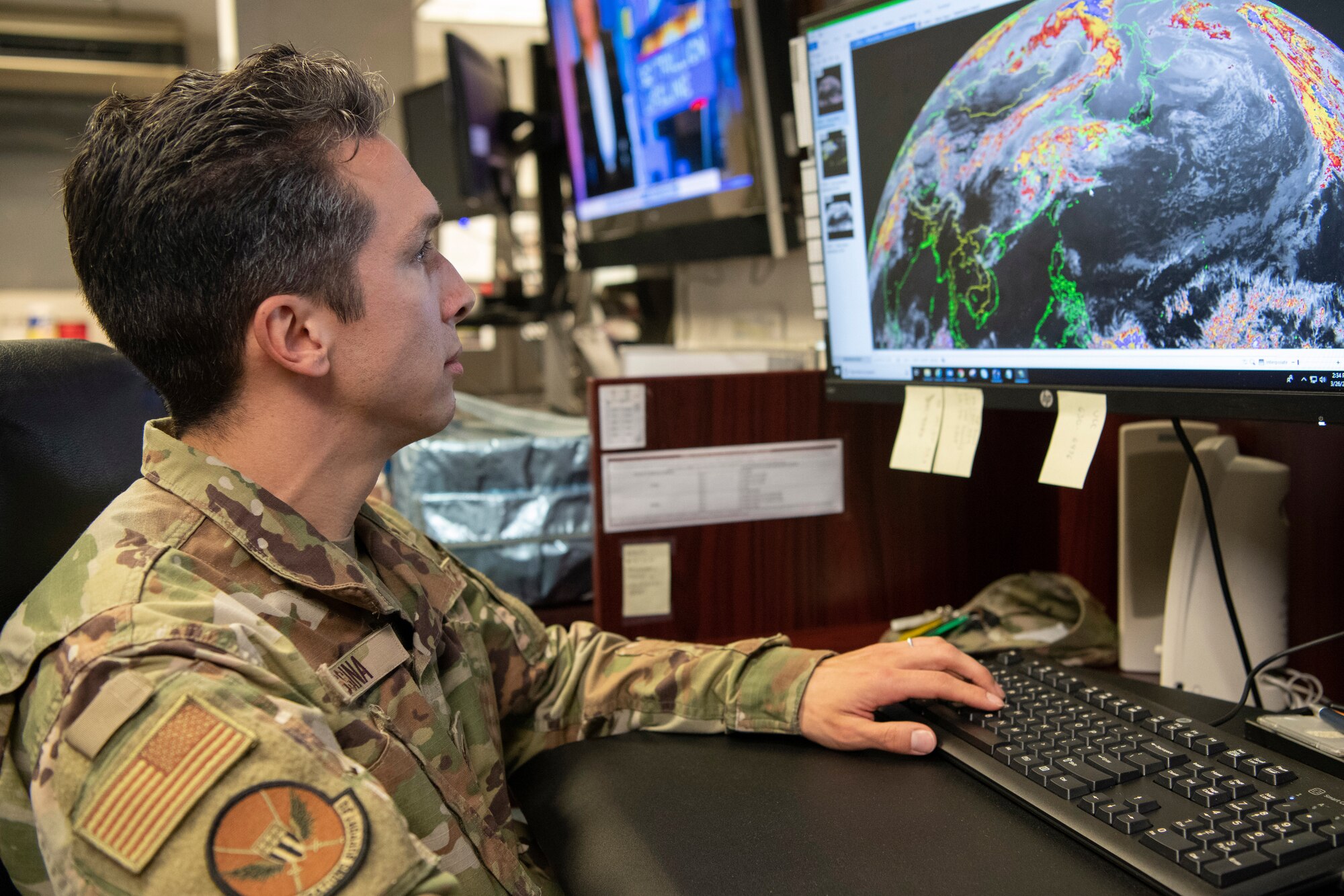 Senior Airman Thomas Messina, 18th Operations Support Squadron weather journeyman, monitors weather conditions Mar. 26, 2020, at Kadena Air Base, Japan. Weather Airmen must maintain accurate weather readings even during adverse conditions. (U.S. Air Force photo by Senior Airman Rhett Isbell)