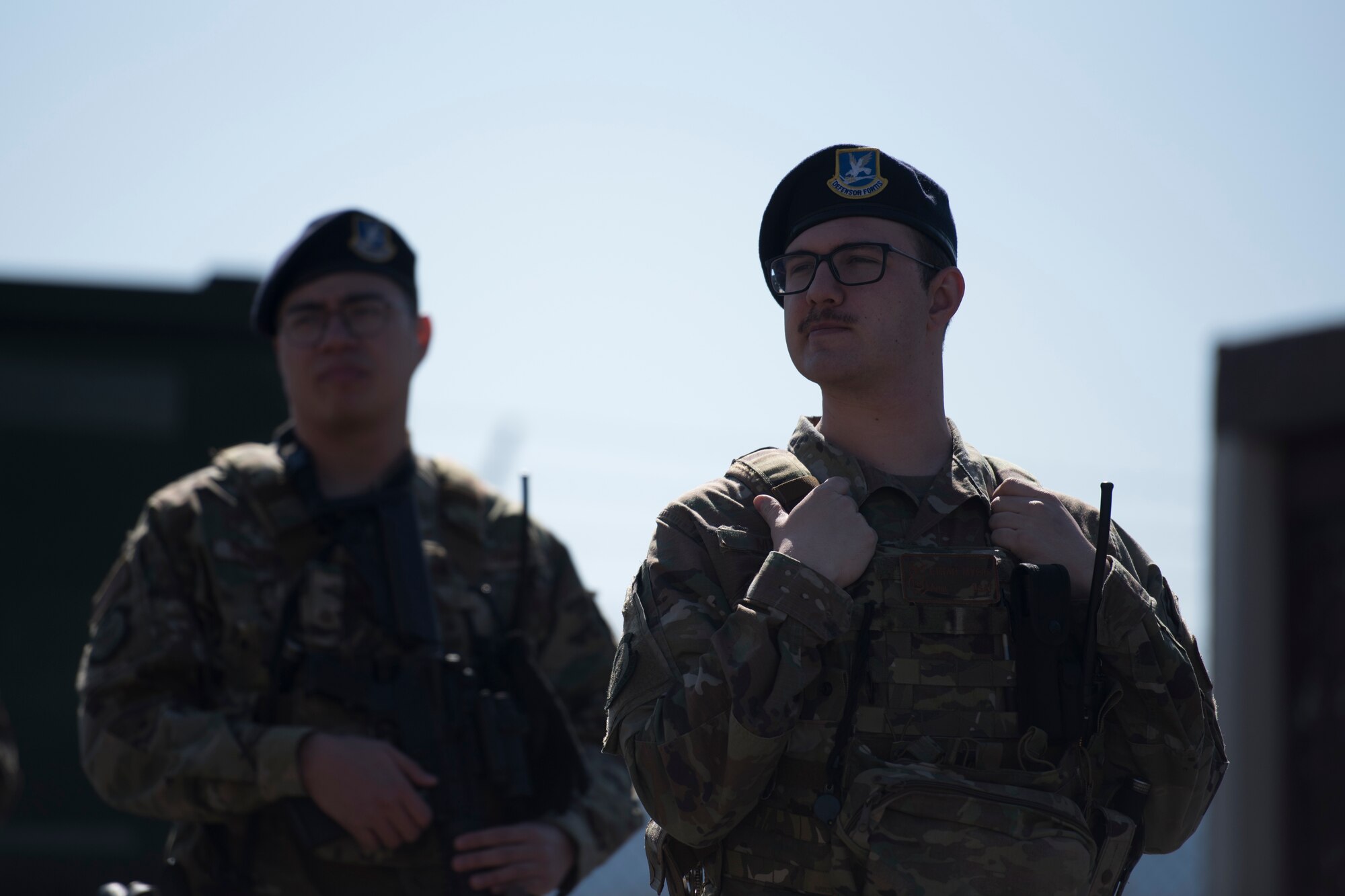 Two 86th Security Forces members participate in guard mount.