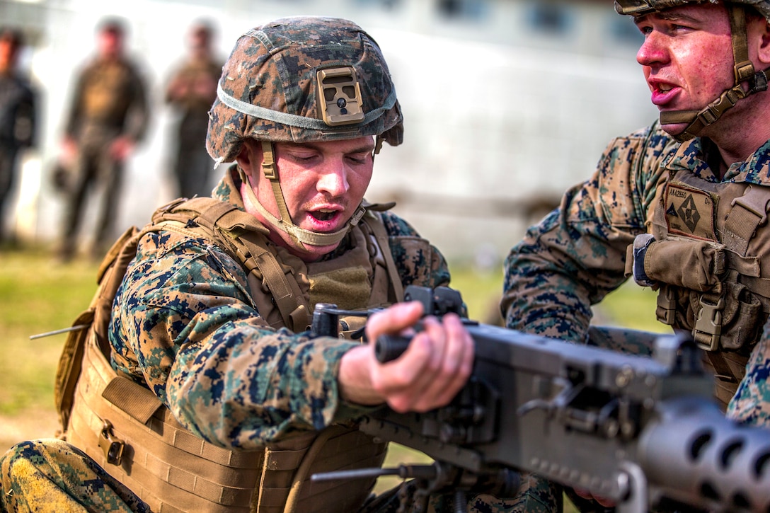 A U.S. Marine participates in a crew-served weapons competition at Camp Schwab, Okinawa, Japan, March 3.