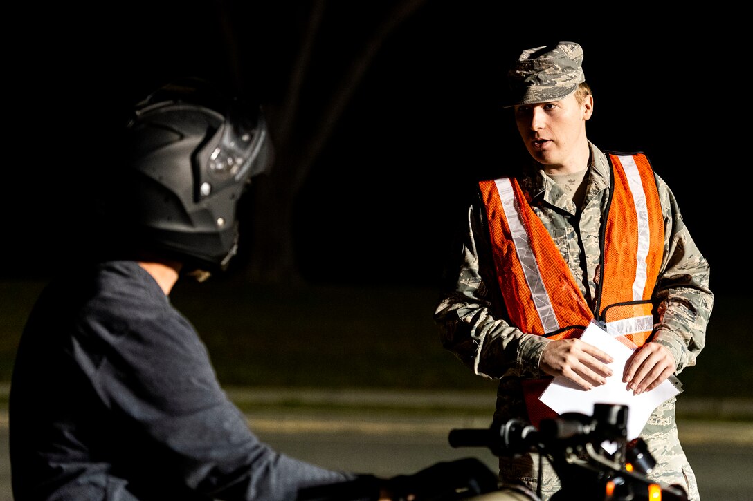 Photo of Airman screening personnel.
