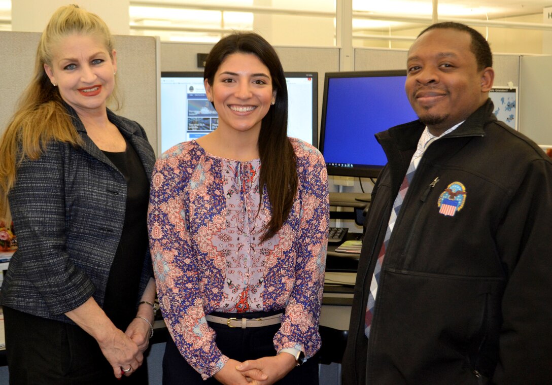 Yvonne Poplawski, Medical’s Collective/Whole of Government division chief, left, Erica Vasquez, a Medical tailored vendor logistics specialist, middle, and Kevin Gleaton, a Continuous Process Improvement management and program analyst, right, pose for a photo at DLA Troop Support March 11, 2020 in Philadelphia.