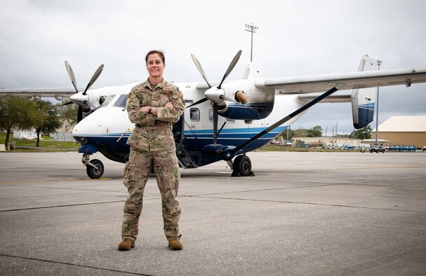 Senior Master Sgt. Jamie Proehl, a special mission aviator assigned to the 711th Special Operations Squadron, takes time for a photo in front of a C-145 Combat Coyote aircraft before a training mission at Duke Field, Fla., March 5, 2020. Proehl, who is also a Combat Aviation Advisor, uses her extensive training and specialized skill set as a CAA to enhance the capabilities of foreign aviation forces in support of combatant commander's objectives around the globe. (Daniel Maffett)