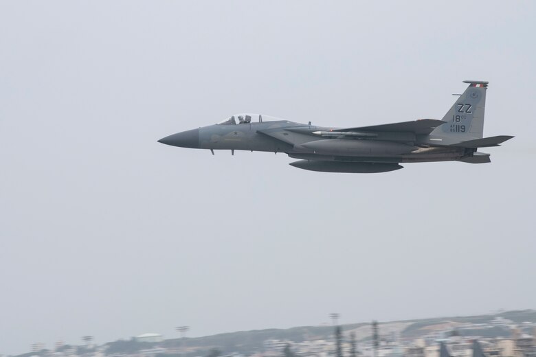 A U. S. Air Force pilot assigned to the 67th Fighter Squadron flies an F-15C Eagle March 27, 2020, at Kadena Air Base, Japan. The F-15C Eagle is a maneuverable, tactical fighter designed to permit the USAF to gain and maintain air supremacy over the battlefield.  Airmen continuously rise to those challenges and ensure mission success on a daily basis. (U.S. Air Force photo by Senior Airman Rhett Isbell)