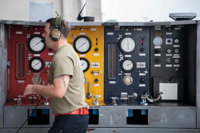 U.S. Air Force Staff Sgt. Zacharias Clemmons, 18th Aircraft Maintenance Squadron crew chief, performs a hydraulics operations check for an F-15C Eagle March 27, 2020, at Kadena Air Base, Japan. The hydraulics check is performed by running a series of tests, which simulate the same conditions likely to occur in-flight. Airmen are working around the clock and ensuring aircraft are ready and able to fly at a moment’s notice. (U.S. Air Force photo by Senior Airman Rhett Isbell)