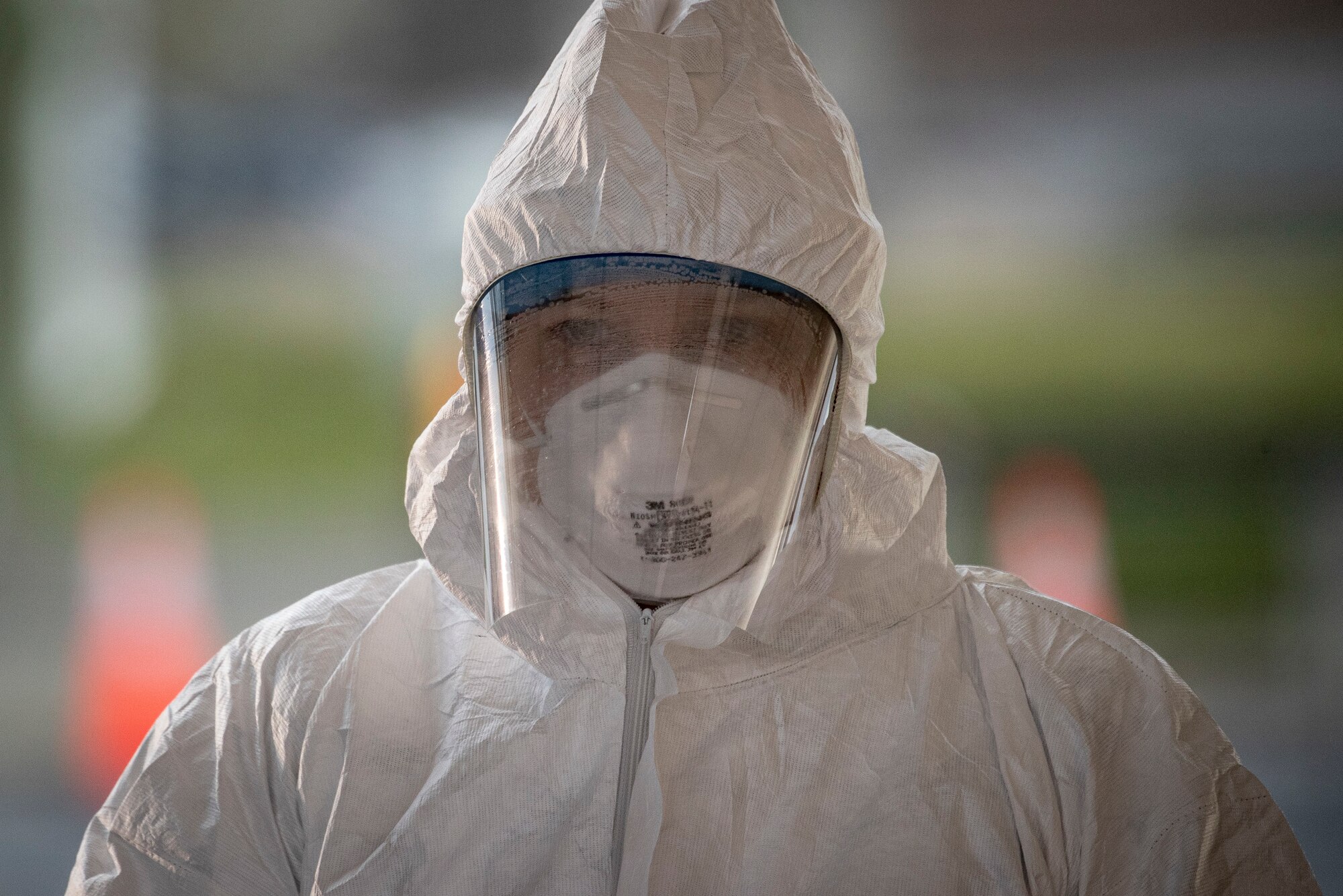 A medical technician pauses between patients at a COVID-19 Community-Based Testing Site at the PNC Bank Arts Center in Holmdel, N.J., March 23, 2020.  The testing site, established in partnership with the Federal Emergency Management Agency, is staffed by the New Jersey Department of Health, the New Jersey State Police, and the New Jersey National Guard.
