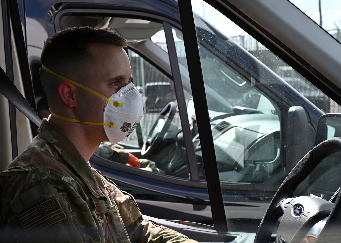 U.S. Air Force Airman First Class Brian Leschke, 175th Maintenance Squadron, Maryland Air National Guard, wears medical personal protective equipment at Baltimore Washington International Airport, March 17, 2020, before transporting passengers from the Grand Princess cruise ship who have been quarantined due to the novel Coronavirus (COVID-19) pandemic. The Maryland National Guard has activated 1,000 personnel with another 1,200 Airmen and Soldiers ready at an enhanced state of readiness. (U.S. Air National Guard photo by Master. Sgt. Chris Schepers)