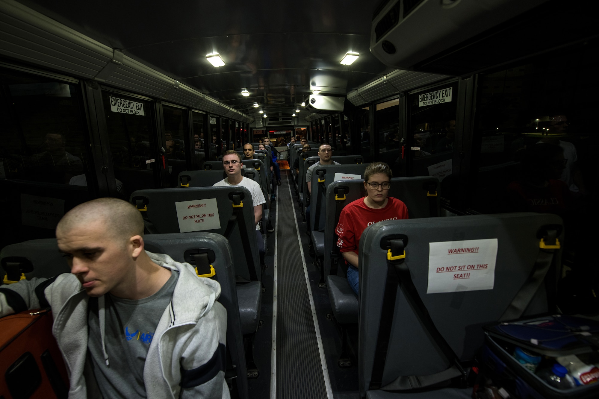 U.S. Air Force basic training trainees that will be placed in a 14-day restriction of movement period arrive at the 737th Training Support Squadron March 24, 2020, at Joint Base San Antonio-Lackland, Texas.