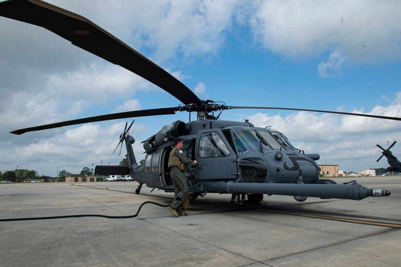 Photo of an Airman preparing for flight.