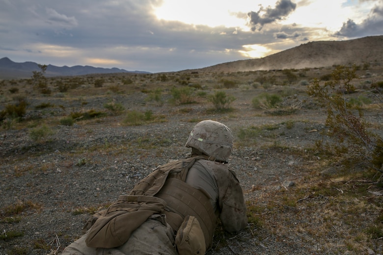 U.S. Marine Corps Pfc. Andy Solis, a rifleman with 2nd Light Armored Reconnaissance Battalion, 2nd Marine Division, fires his rifle at a notional enemy target during a live-fire range on the National Training Center 20-05 in Ft. Irwin, Calif., March 22, 2020. The National Training Center is a unique opportunity that allows Marines and Sailors to train with and against a peer competitor in a conventional combat operational setting. (U.S. Marine Corps photo by Cpl. Elijah J. Abernathy)