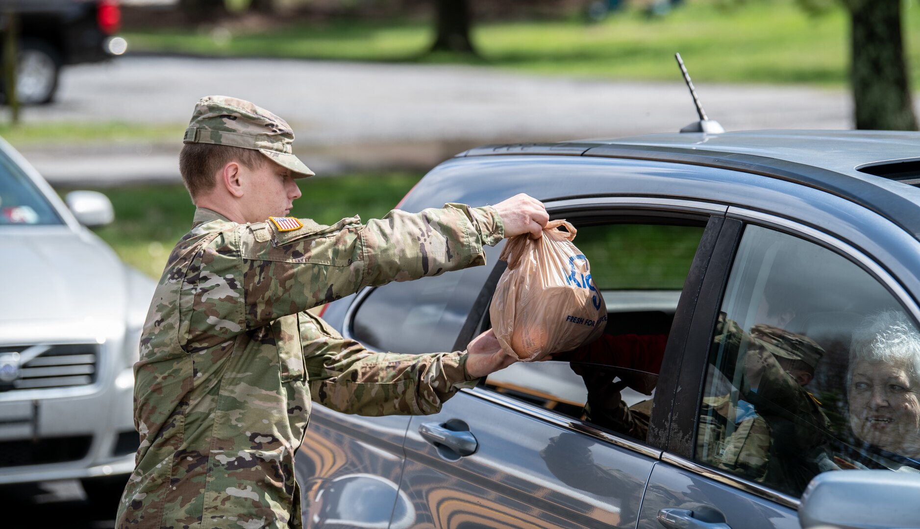 Members of the West Virginia National Guard assist volunteers with the Greater Greenbrier Long Term Recovery Committee in preparing meals for more than 3,600 school-age students throughout Greenbrier County, West Virginia, during the COVID-19 pandemic outbreak, March 25, 2020, in Lewisburg, West Virginia. The Soldiers supported more than 30 volunteers in packaging and delivering the meals to needy children around the county and will continue to do so for the duration of the outbreak. (U.S. Army National Guard photo by Edwin L. Wriston)