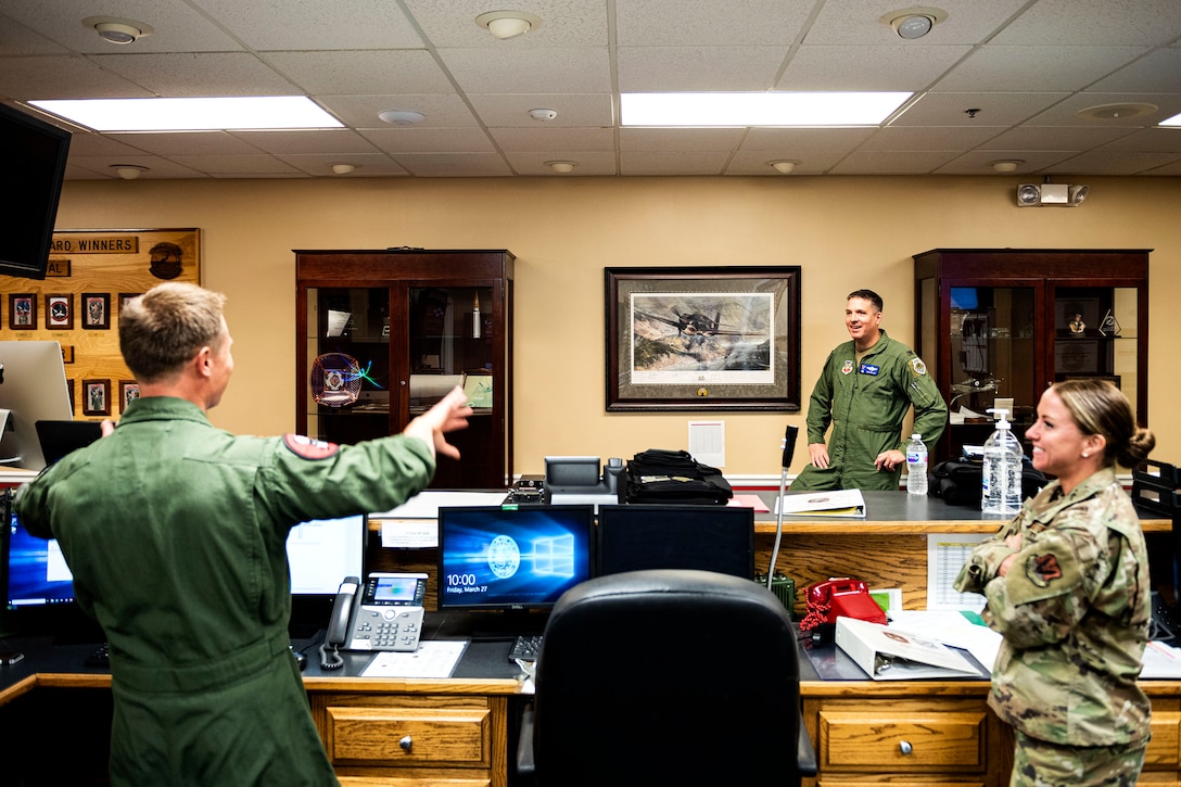 Photo of Airmen sharing a laugh.