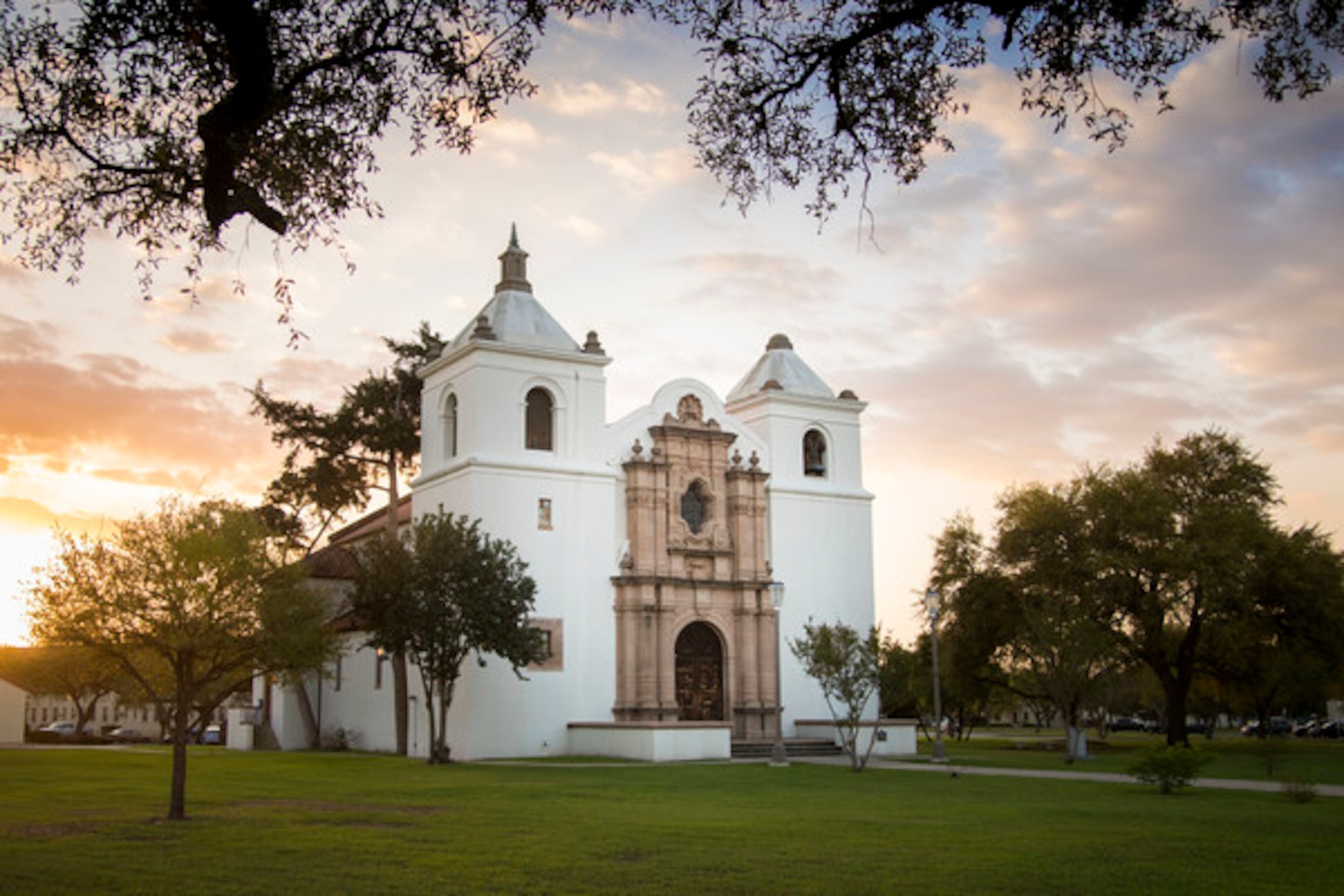 JBSA-Randolph's main chapel is photographed during the morning with the sun rising behind it.