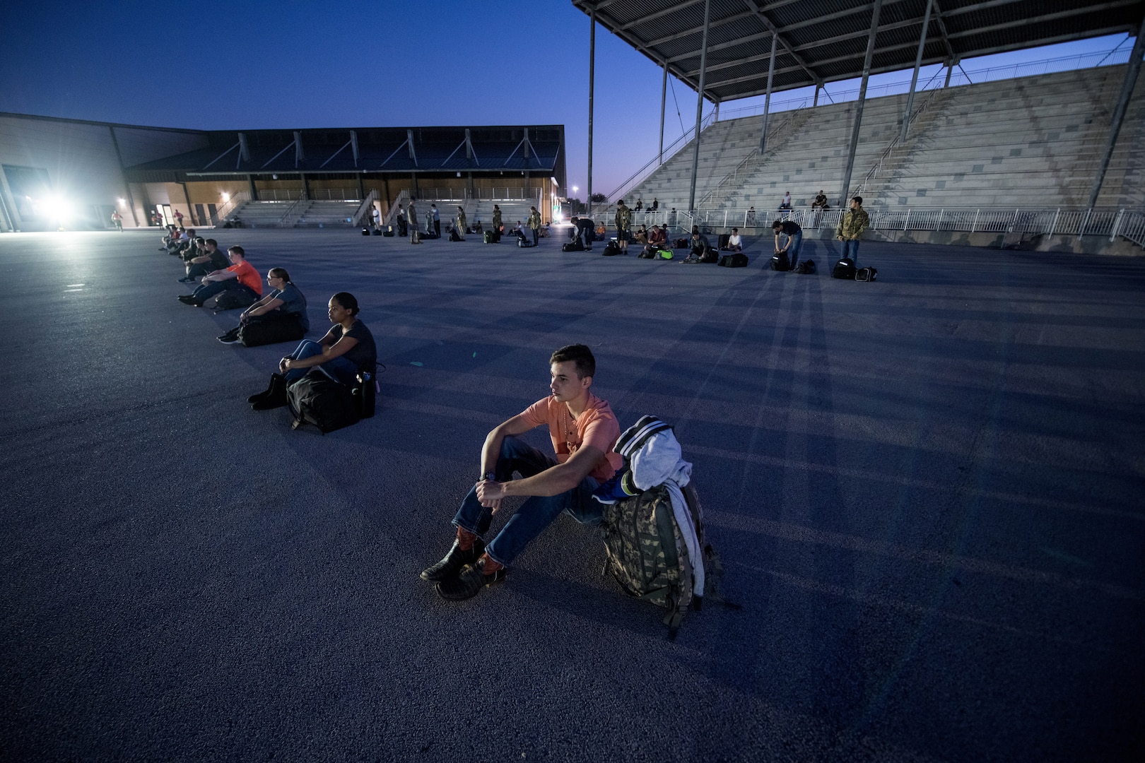 U.S. Air Force basic training trainees that will be placed in a 14-day restriction of movement period arrive at the 737th Training Support Squadron March 24, 2020, at Joint Base San Antonio-Lackland, Texas.